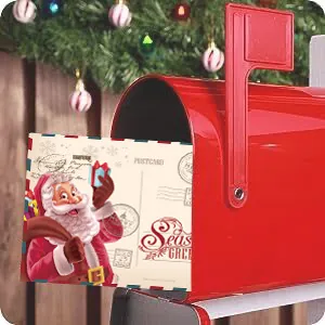 Detailed view of a vintage Christmas postcard featuring Santa Claus inside a red mailbox.