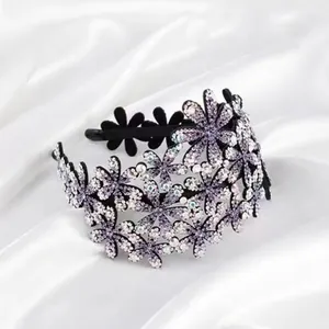 Elegant black non-slip headband featuring intricate purple floral rhinestone decorations