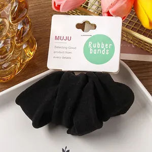 B452-1 Black high-elasticity hair scrunchie set of 4 with a MUJU display card packaging