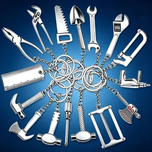 Set of creative metal miniature tool keychains with a realistic silver metallic finish.
