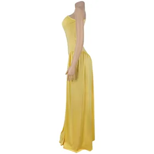 Side profile view of an elegant bright yellow floor-length strapless tube maxi dress