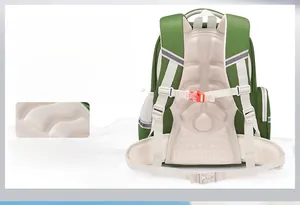 Close-up of the breathable ergonomic back panel on a green children's backpack