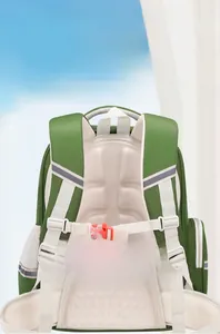 Back view of ergonomic green school backpack with thickened straps and whistle buckle