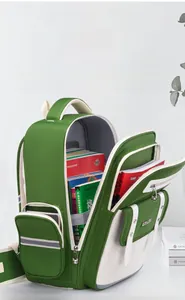 Detailed view of green school backpack showing multi-layer large capacity storage
