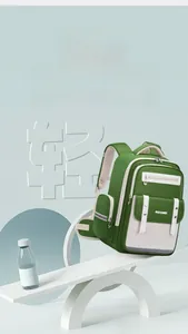 Ergonomic lightweight schoolbag for children with weight comparison to a water bottle