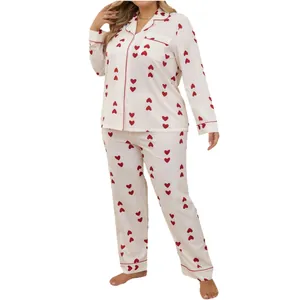 Sweet plus size women's pajama set featuring red heart print and long sleeves for home wear