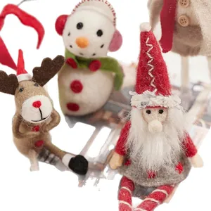 Handmade needle felted wool Christmas ornaments featuring Santa, Snowman and Reindeer figurines
