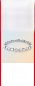 Detailed view of a 925 sterling silver bracelet featuring 4mm round-cut moissanite stones