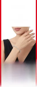Elegant moissanite tennis bracelet worn on model's wrist for detailed showcase