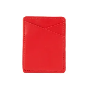 Detail view of a vibrant red PU leather adhesive phone card holder with double card slots.