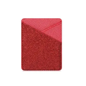 Detailed macro view of a red glitter adhesive phone wallet with diagonal pocket