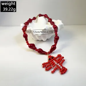 Red acrylic beaded necklace with lobster pendant, 42+5.5cm length and 39.22g weight.