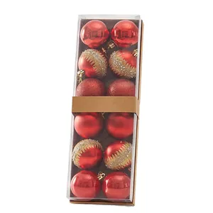 Set of 12 red Christmas ball ornaments with glossy, matte and glitter finishes for decor.