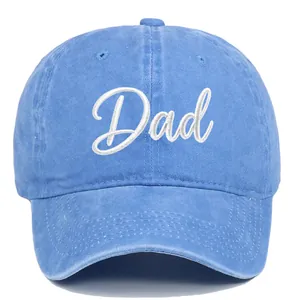 Close-up detail of a vintage washed blue cotton baseball cap with white Dad embroidery