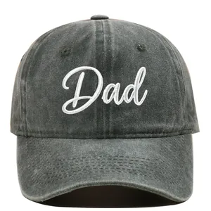 Close-up of a vintage washed grey baseball cap with white Dad script embroidery detail