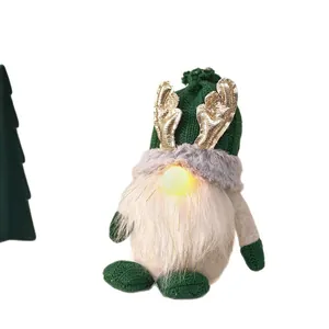 Handmade green Christmas gnome plush doll with LED light-up nose and golden antlers