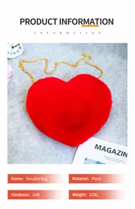 Close-up detail of a red heart-shaped plush crossbody bag with a gold chain strap