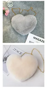 Close-up of heart-shaped faux fur crossbody bags with elegant gold chain straps