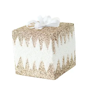 Champagne gold and white glitter gift box Christmas tree ornament with white bow