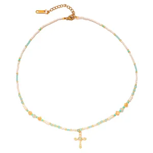 Bohemian beaded necklace with turquoise shells and gold stainless steel cross pendant