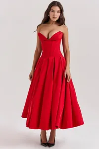 Detailed view of red fishteel corset bodice with heart-shaped neckline on a maxi dress