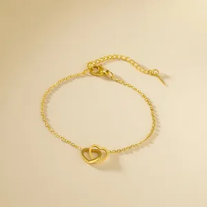Elegant gold double heart pendant bracelet with adjustable chain and lobster clasp