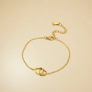 Elegant gold-plated stainless steel bracelet featuring an interlocking double heart design