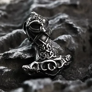 Vintage stainless steel Viking Thor Hammer pendant with intricate Nordic carvings
