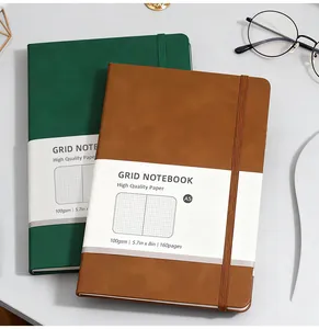 Detailed view of A5 grid notebook with 100gsm paper and elastic closure band