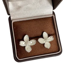 French style silver flower earrings with iridescent shell petal inserts in velvet box