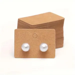 Kraft paper earring display cards with pearl studs showing usage detail for small businesses