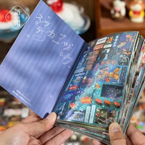 Close-up of Midnight Sweetheart DIY sticker book showing various decorative patterns