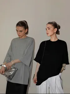 Minimalist oversized grey and black batwing sleeve T-shirts featuring stylish side slits