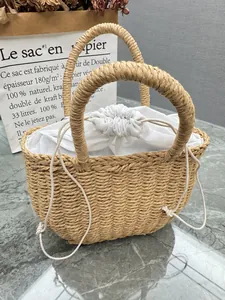Hand-woven straw handbag with white drawstring lining for summer vacation