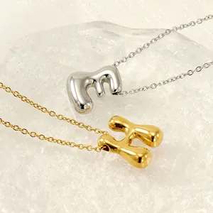 Polished stainless steel puffy bubble initial necklaces in gold and silver finishes