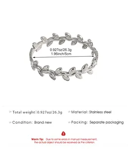 Detailed view of hollow leaf pattern stainless steel bracelet with sizing information