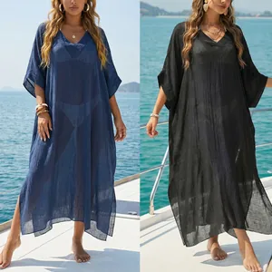 Detail view of women's V-neck loose beach cover-up maxi dress with side slit for summer