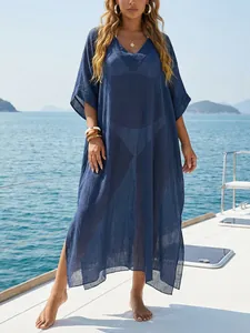 Elegant navy blue V-neck sheer beach cover-up maxi dress for women on summer vacation