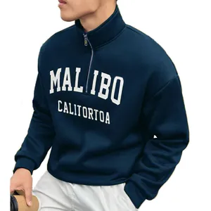 Detailed view of a men's vintage navy blue half-zip sweatshirt with stand collar