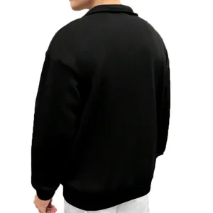 Detailed back view of a men's black vintage half-zip sweatshirt with a loose fit