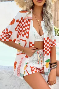 Close-up detail of bohemian printed vacation shirt and matching shorts set on model