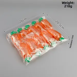 Vista dettagliata di 8 scatole di caramelle a forma di carota, dimensioni 26x20,5x5cm