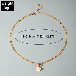 Detailed view of the gold shell pearl necklace with weight and size specifications