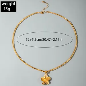 Close-up of gold flower pendant necklace showing 15g weight and length details