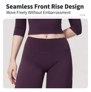 Detail of high-waisted wide-leg yoga pants in deep purple with seamless front design