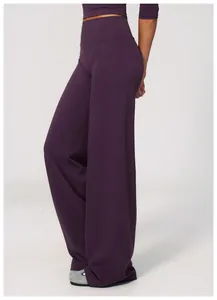 Detailed side view of purple high-waisted brushed wide-leg athletic yoga pants for women