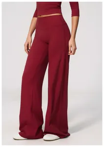 Detailed view of women's high-waisted wine red wide-leg yoga sports pants with soft texture