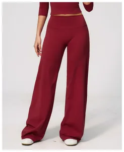 High-waist burgundy wide-leg yoga pants with soft brushed texture and relaxed fit