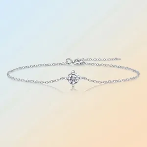 Minimalist silver chain bracelet with a sparkling round Moissanite gemstone