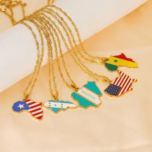 Macro shot of 18K gold plated titanium steel necklaces with diverse country map pendants